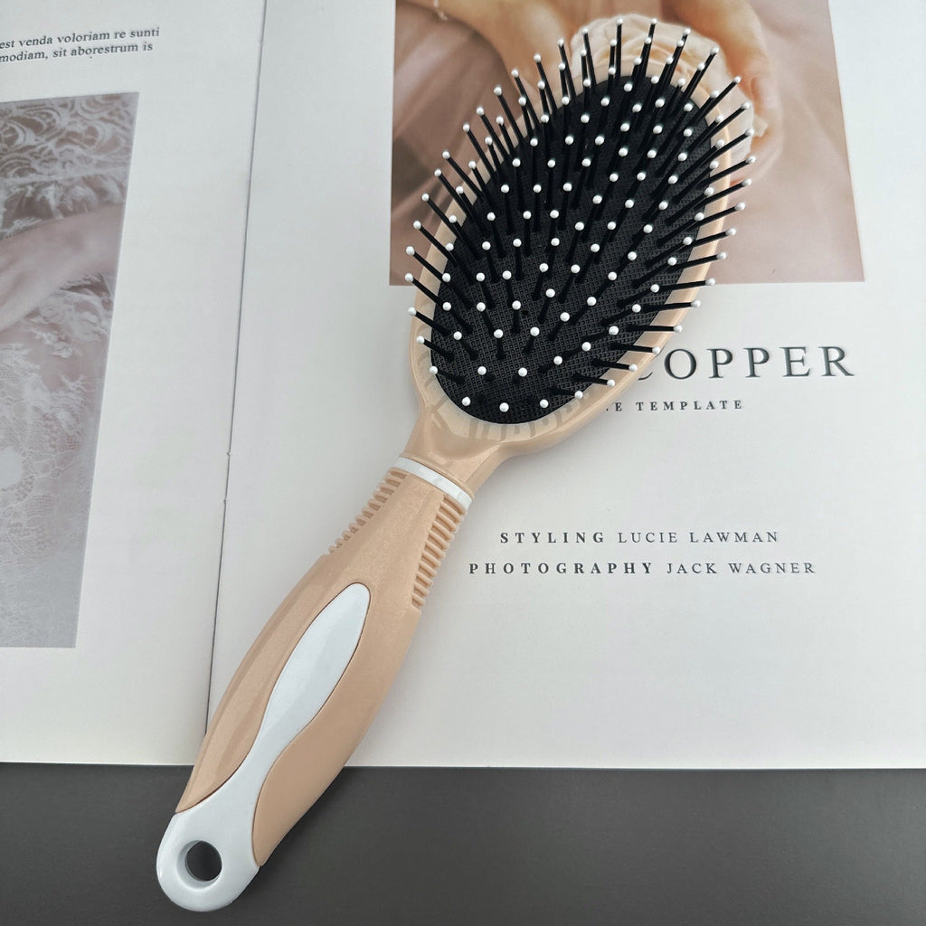 Universal hair comb on a wooden surface - image 4