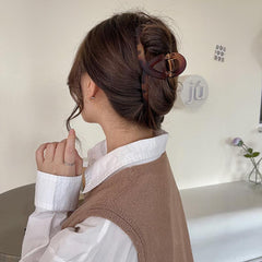 Amber colour matte resin hair claw clip shown