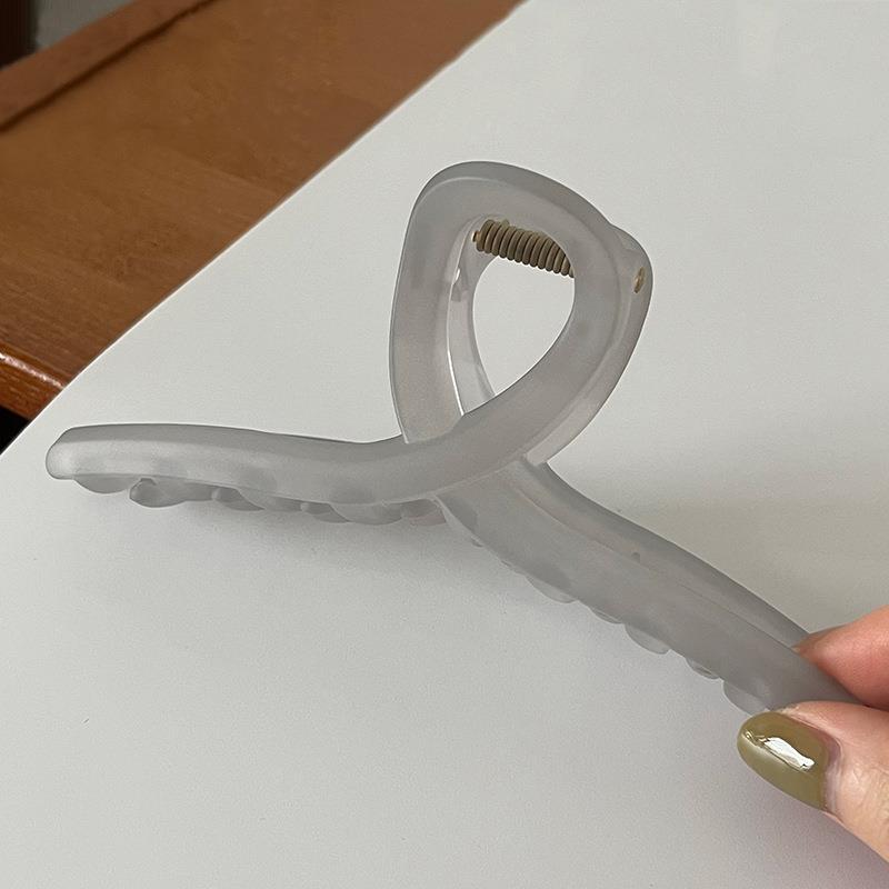 Durable hair claw clip in action holding hair