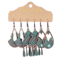 geometric earrings styled with vintage apparel