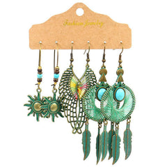 close-up of geometric design long tassel earrings