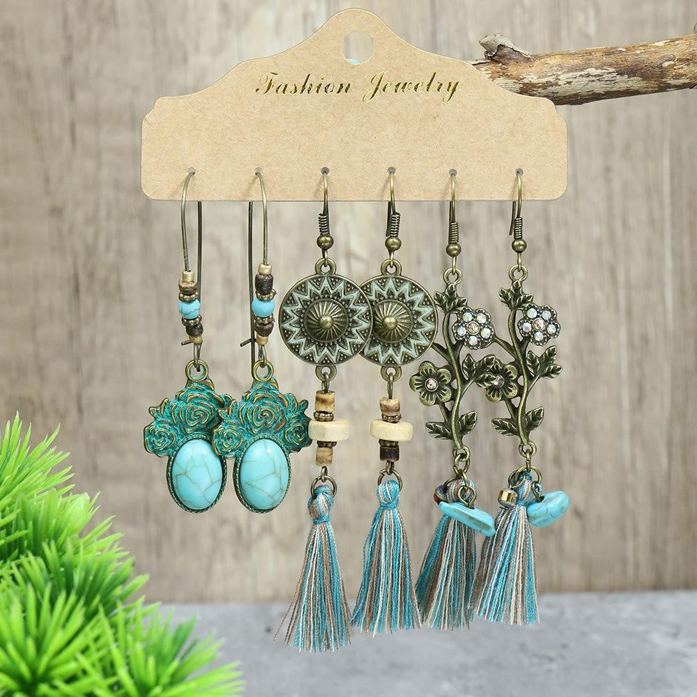 purple tassel earrings on display