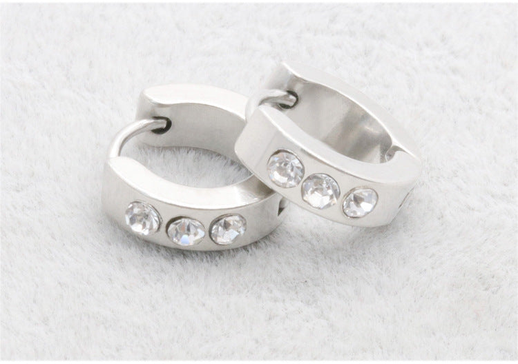 Elegant stainless steel earrings close-up view