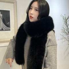 Close-up of faux fur long scarf in grey