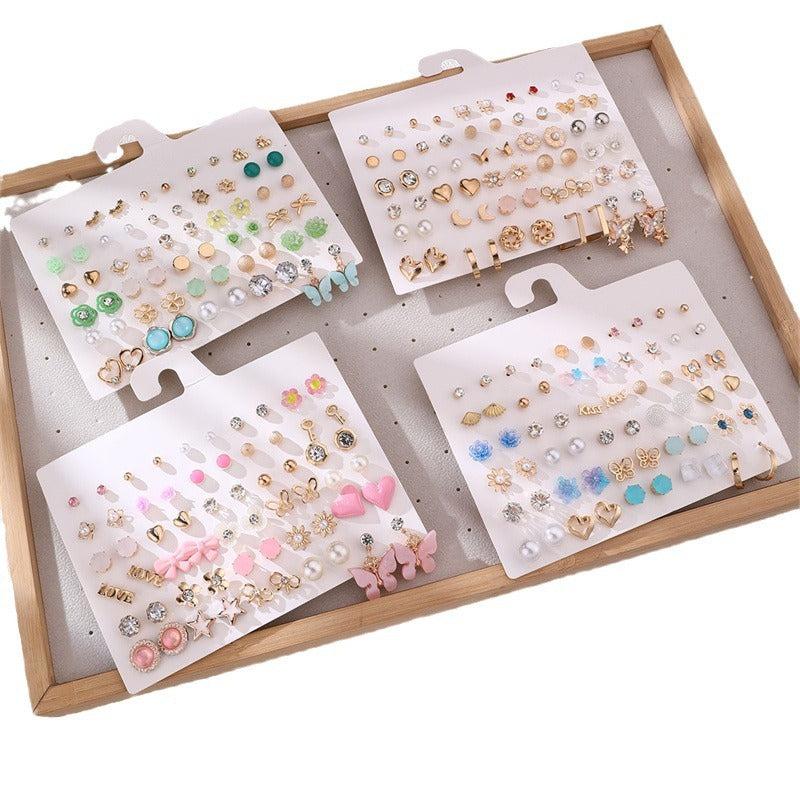 Versatile earrings displayed on a light background