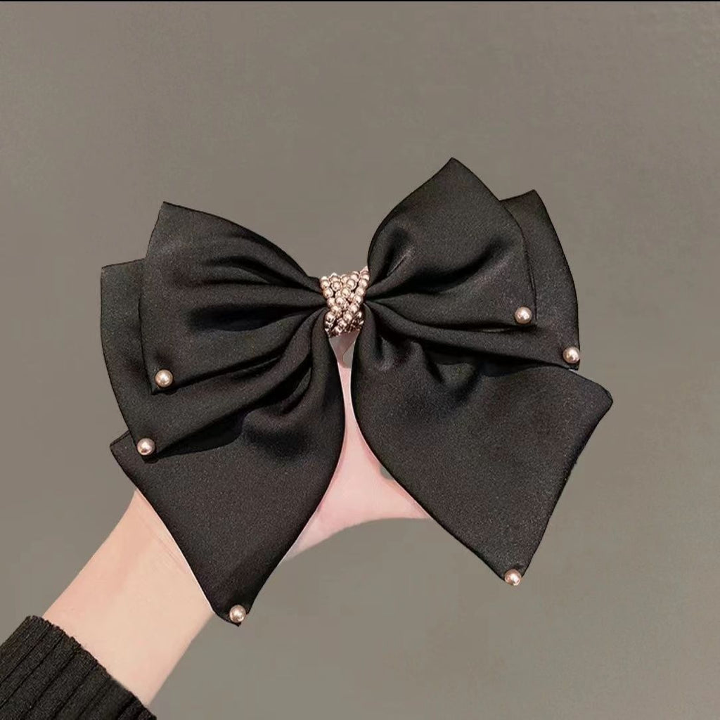 Detailed view of pearl accents on hair clip