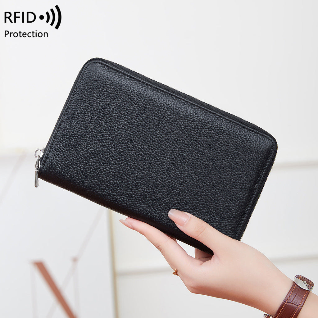 Open leather wallet displaying cards and cash organisation