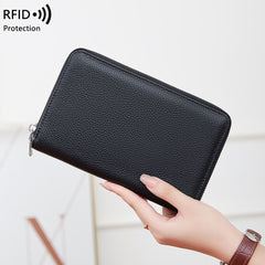 Open leather wallet displaying cards and cash organisation