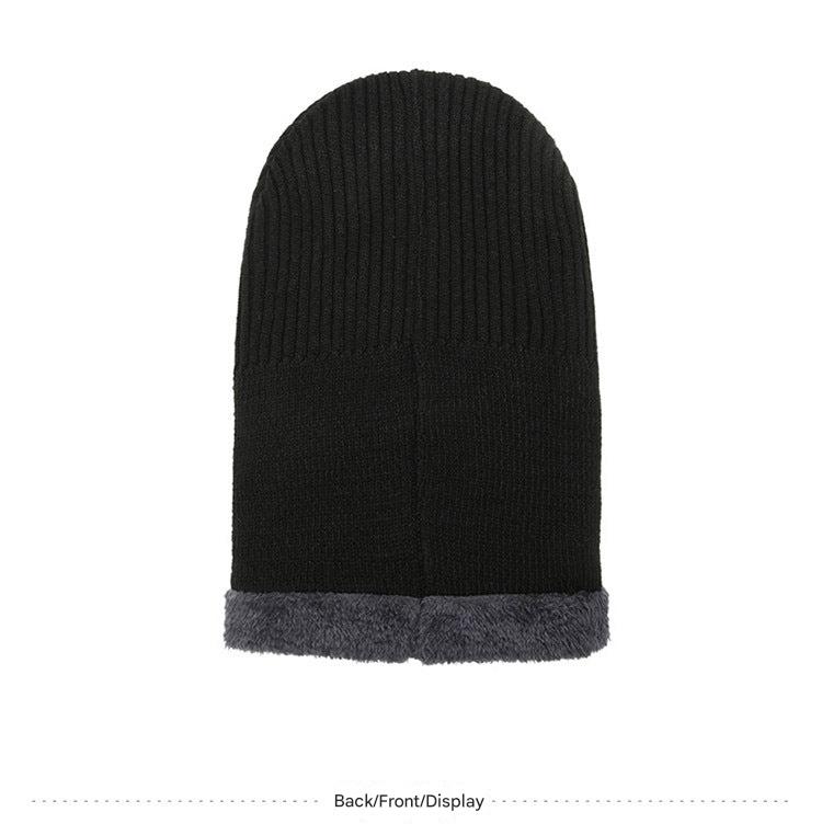 Outdoor model wearing a black winter beanie
