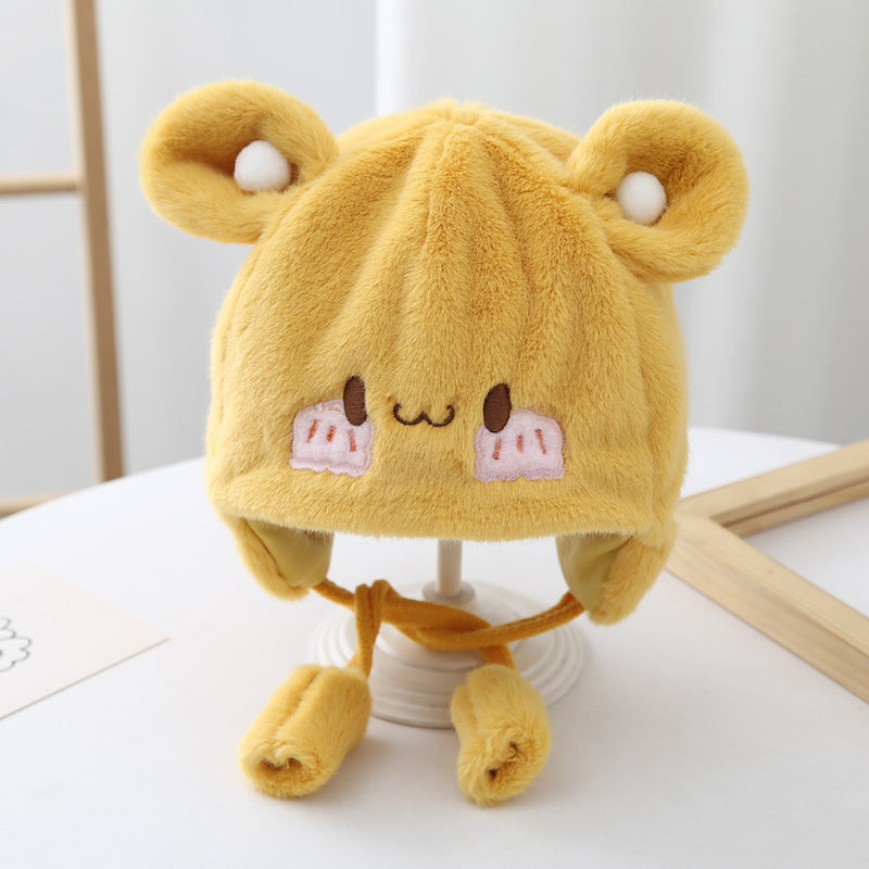Front view of baby wearing Cozy Plush Hat