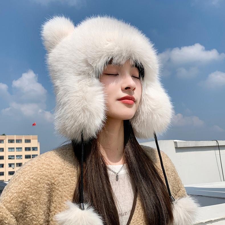 Cute plush winter hat with bear ears side view