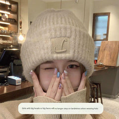 Stylish cream colour warm beanie for women