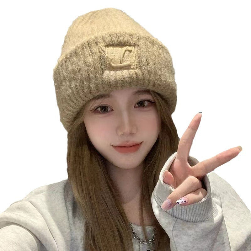 Relaxed fit knit hat for women in light khaki