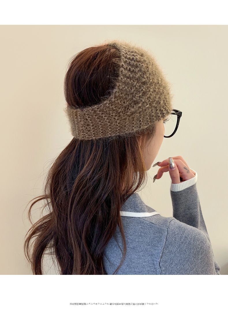 Stylish knitted ear warmer in black colour