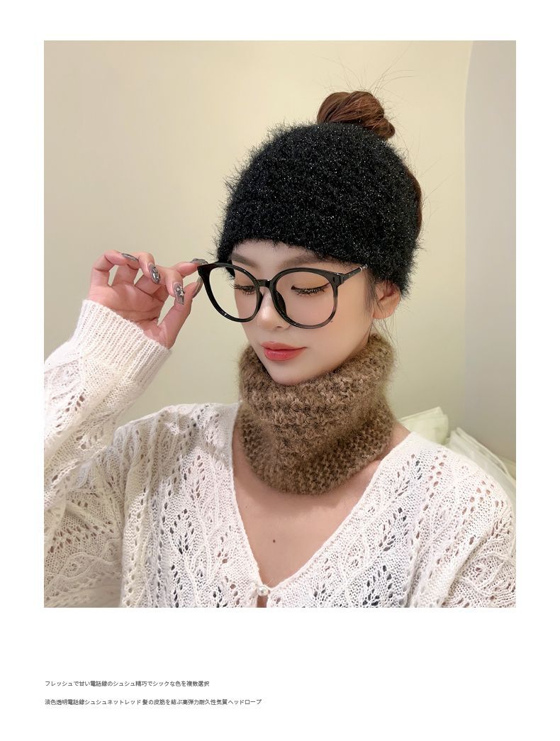 Cozy knitted ear warmer in beige colour