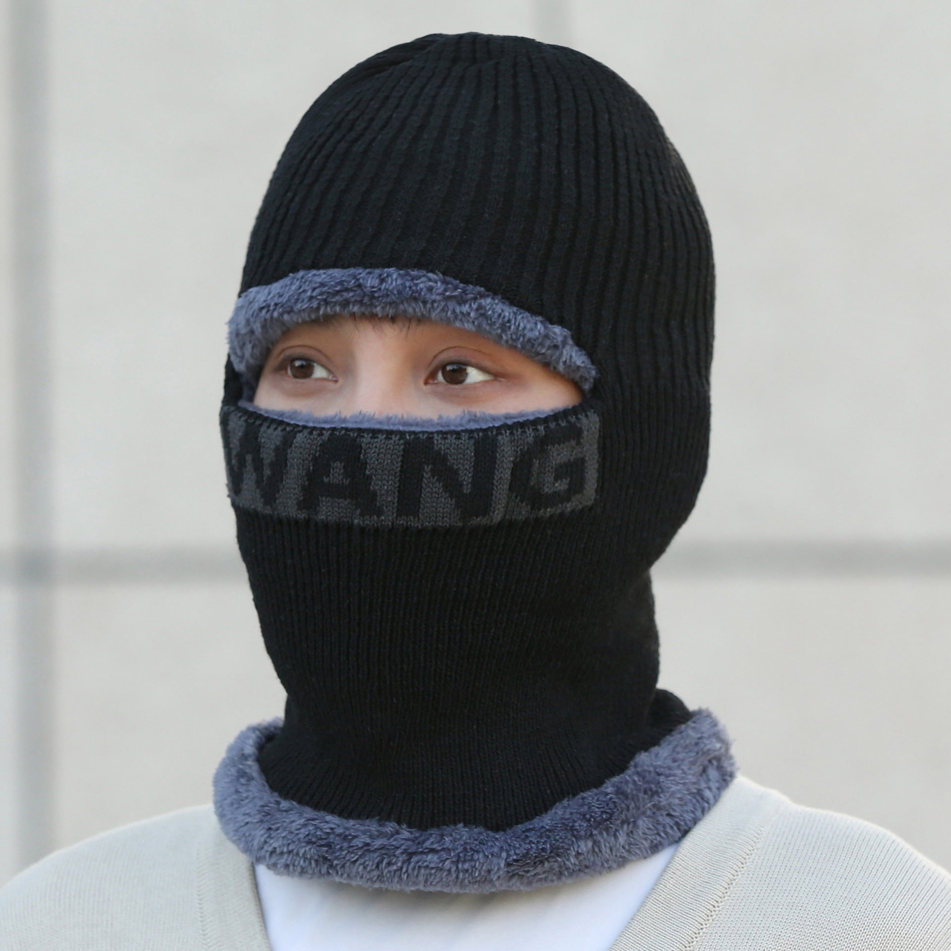 Men wearing winter fleece knit cap outdoors