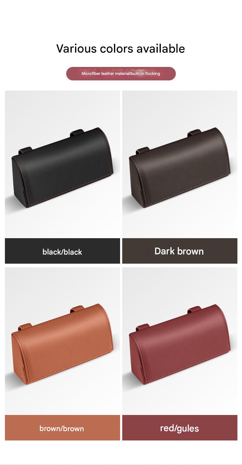Close-up of car sunglasses holder in brown leather