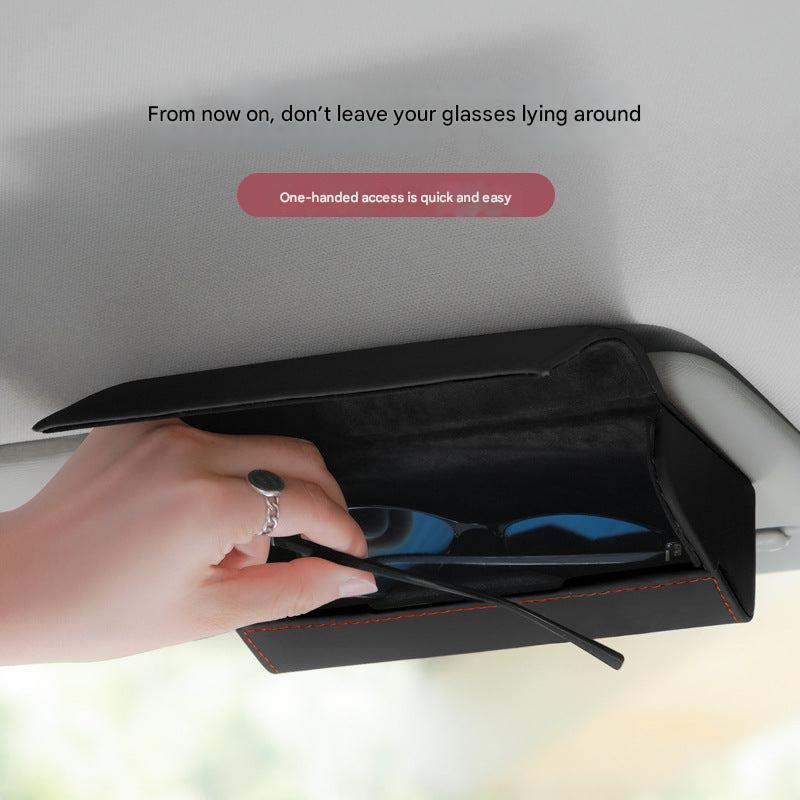 Interior view of car sunglasses holder with documents