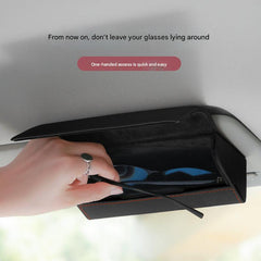 Interior view of car sunglasses holder with documents