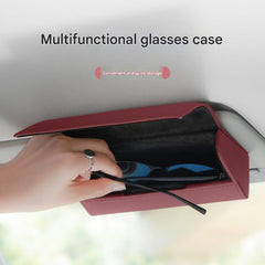 Close-up of car sunglasses holder in brown leather