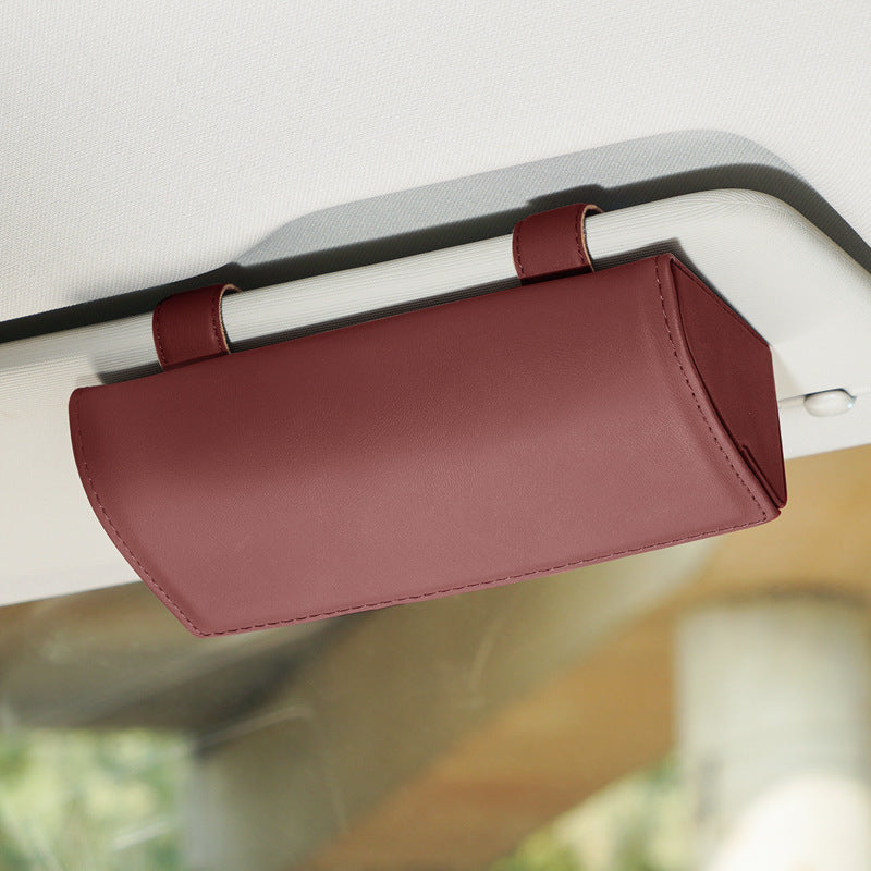 Sunglasses holder with essential items stored