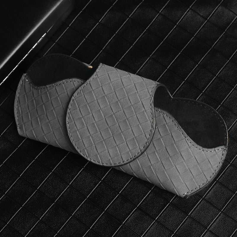 Leather sunglasses case in car