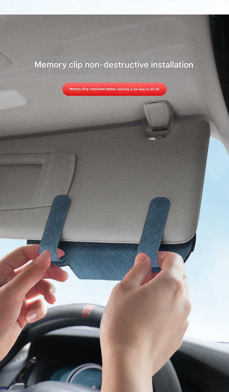 Leather sunglasses case in car