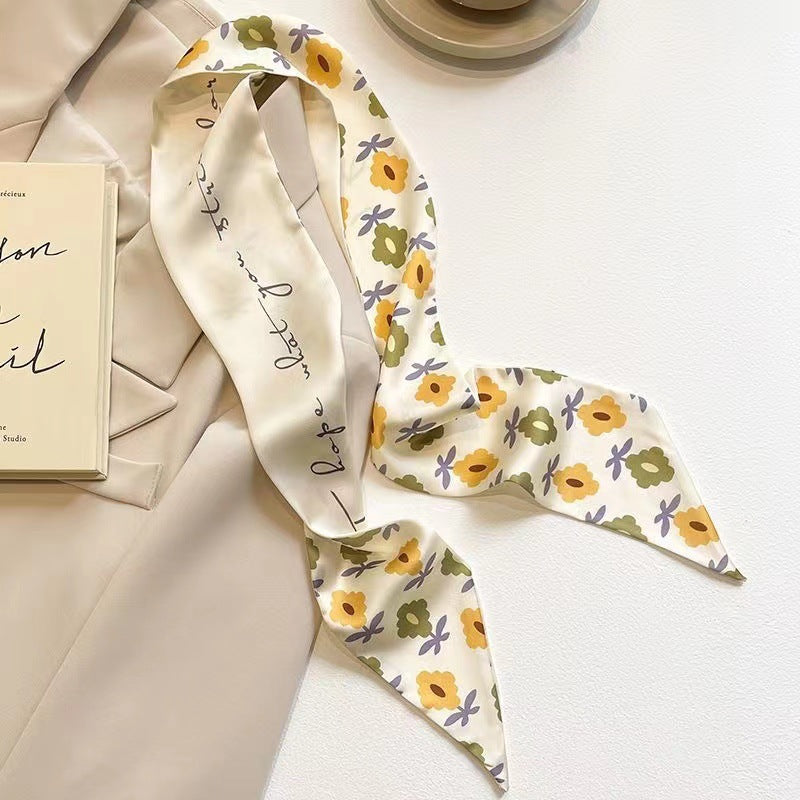 stylish yellow scarf with floral patterns