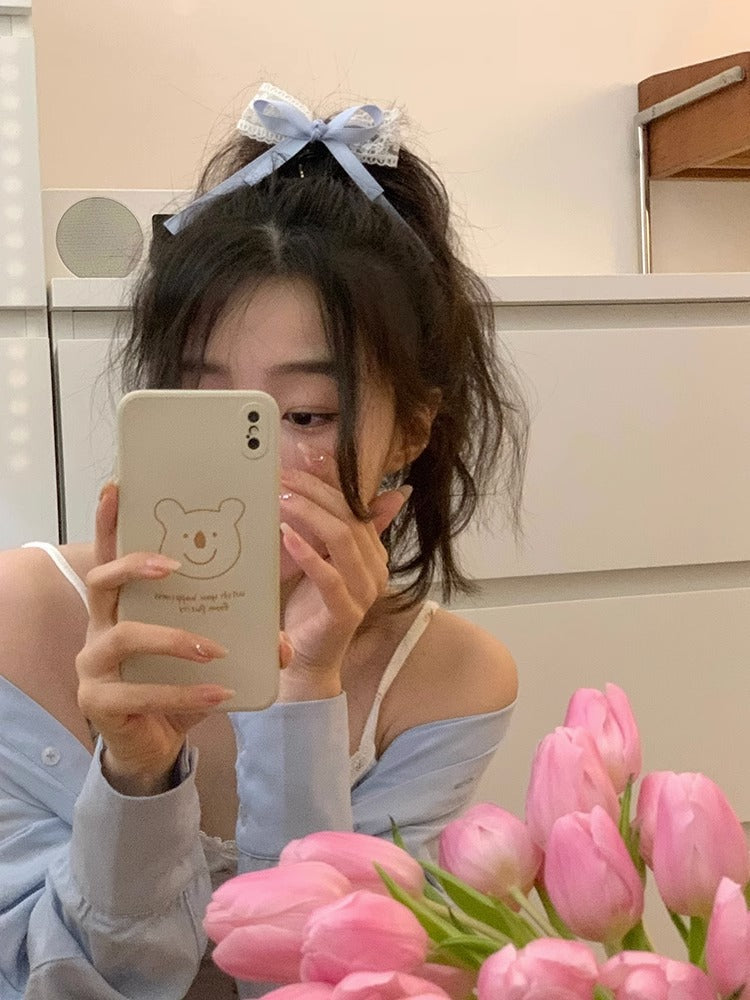 Chic hair clips set against a pastel background
