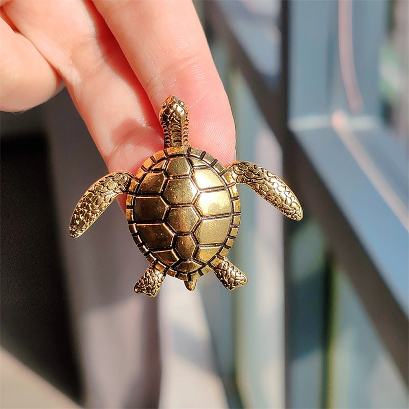 Turtle Brooch displayed on jacket
