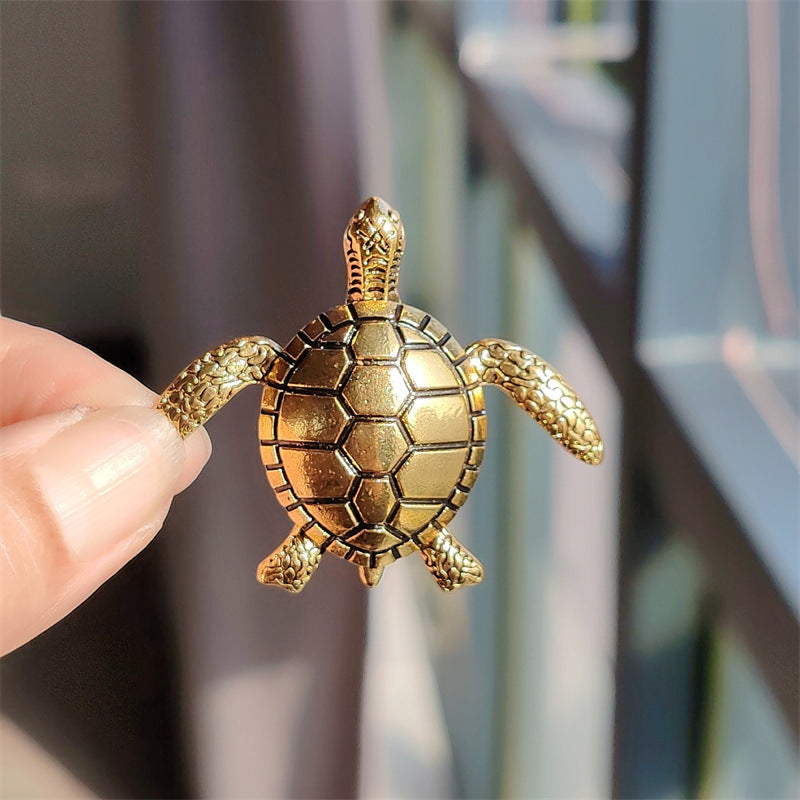 Turtle Brooch displayed on jacket