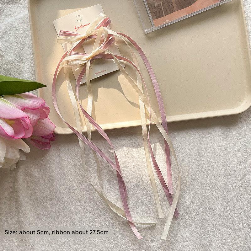 Stylish white bow hair clip for ballet fans