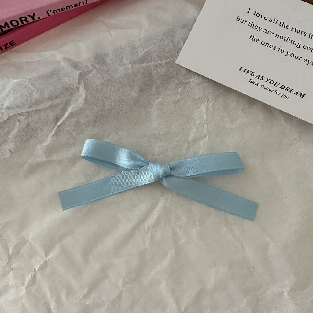Stylish white bow hair clip for ballet fans