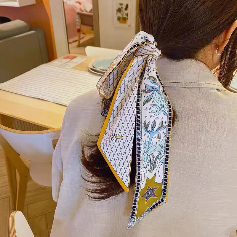 close-up of tarot print scarf on a surface 2