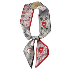 detailed view of fabric and print of faux silk scarf 5