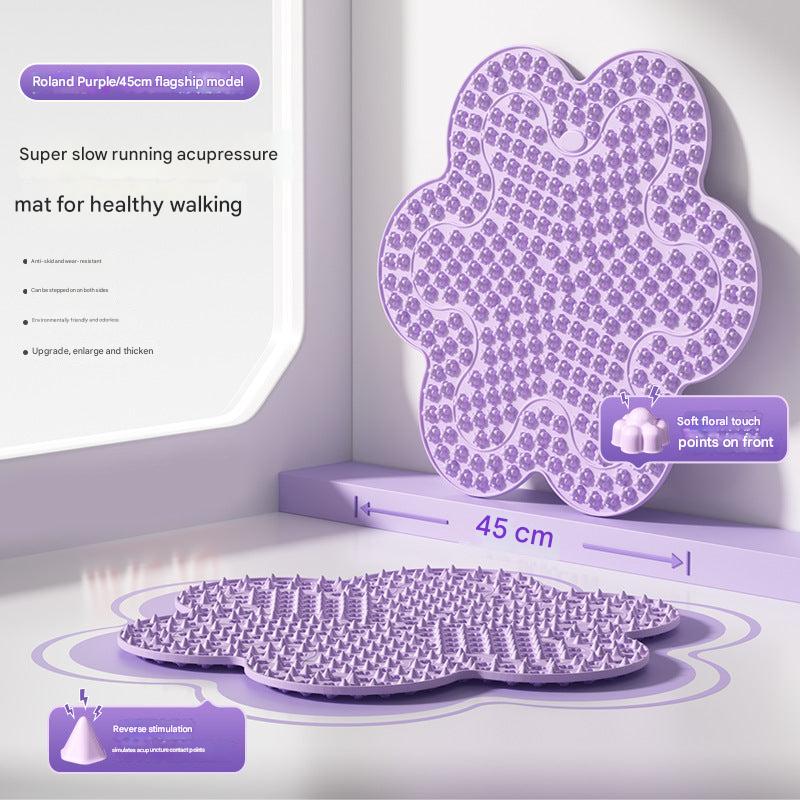 Acupressure mat next to yoga equipment