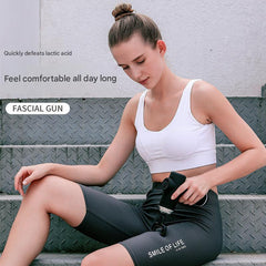 Portable Electric Massage Gun shown in use