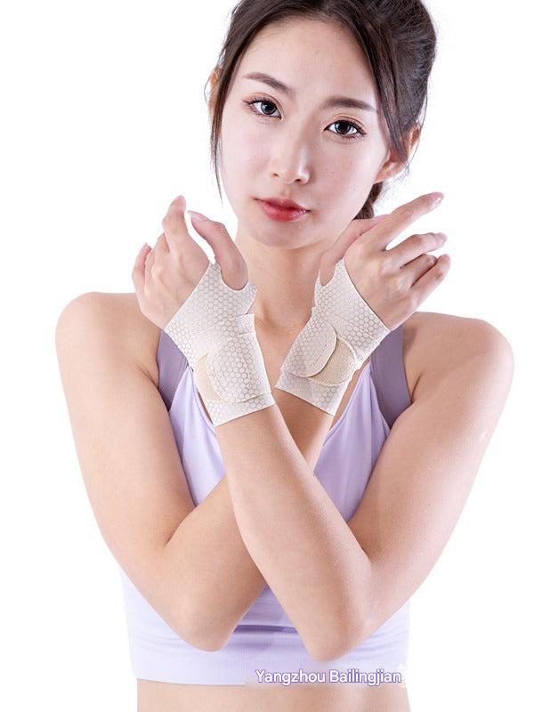 Adjustable sports wrist brace in pink for yoga