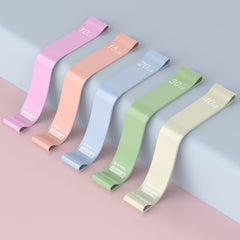 Close-up of purple and pink resistance bands