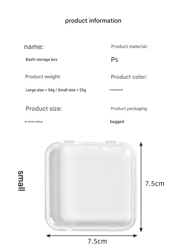 open clear acrylic box showcasing collectibles