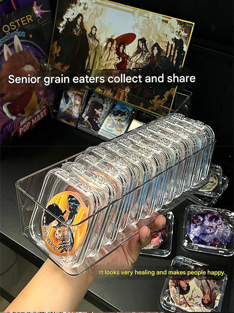 acrylic box containing badges and collectibles