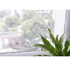 Self-adhesive mosquito mesh screen on window