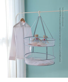 Compact folding drying rack in use at home