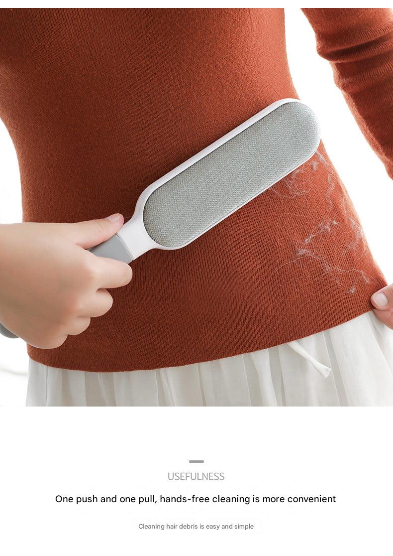 Pet owner using the hair remover brush