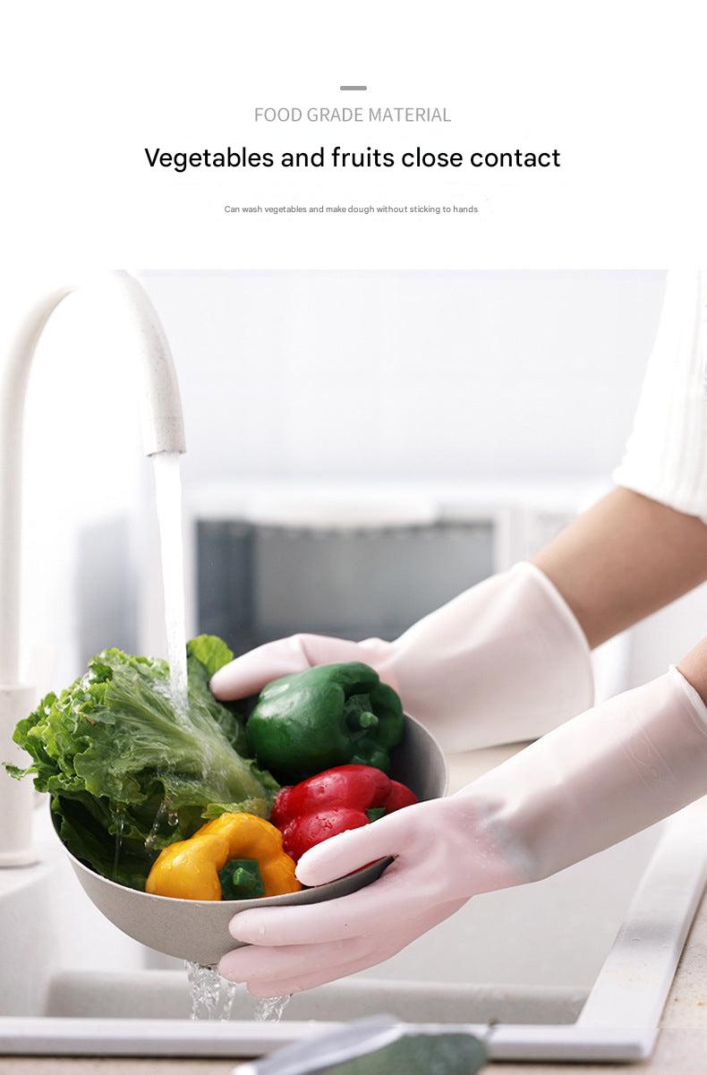 Close-up of cleaning gloves on a kitchen counter