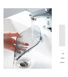 Water-saving leaf soap holder in grey colour
