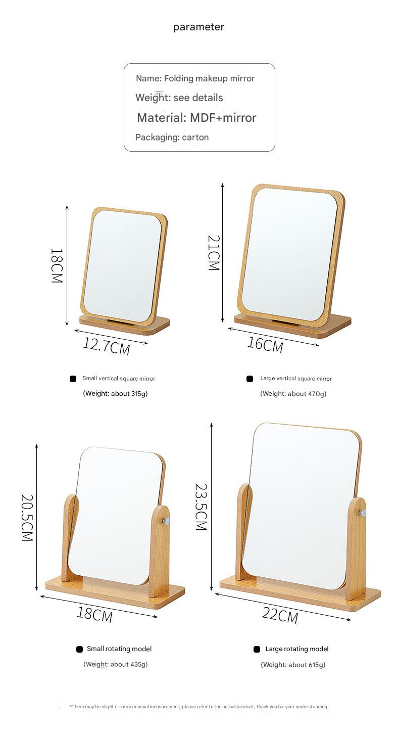 Close-up of foldable wooden makeup mirror with glass surface