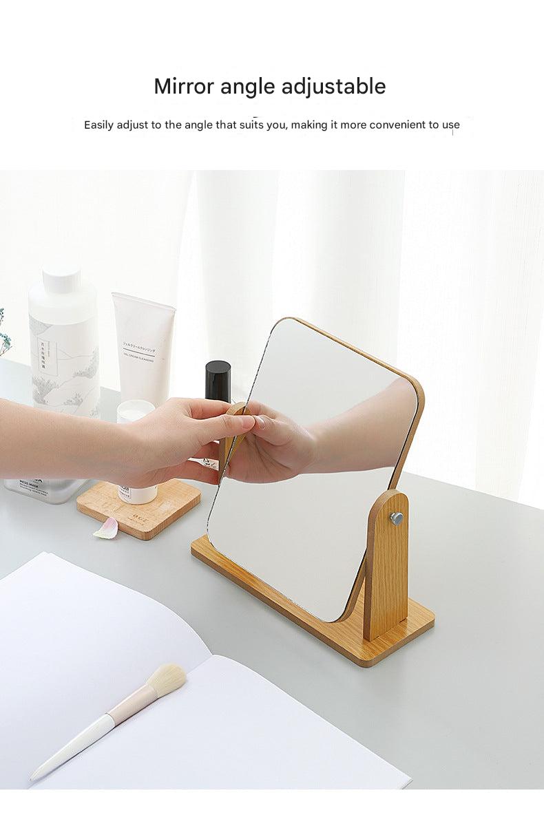 Stylish wooden frame of adjustable makeup mirror displayed