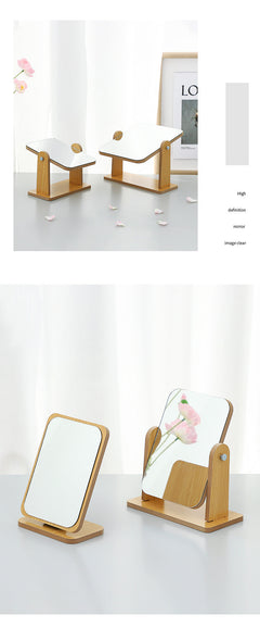 Close-up of foldable wooden makeup mirror with glass surface