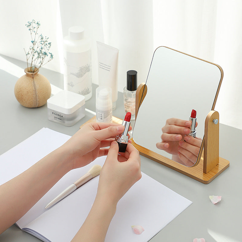 Stylish wooden frame of adjustable makeup mirror displayed